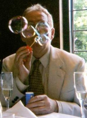 Charles J. Fillmore blowing bubbles
